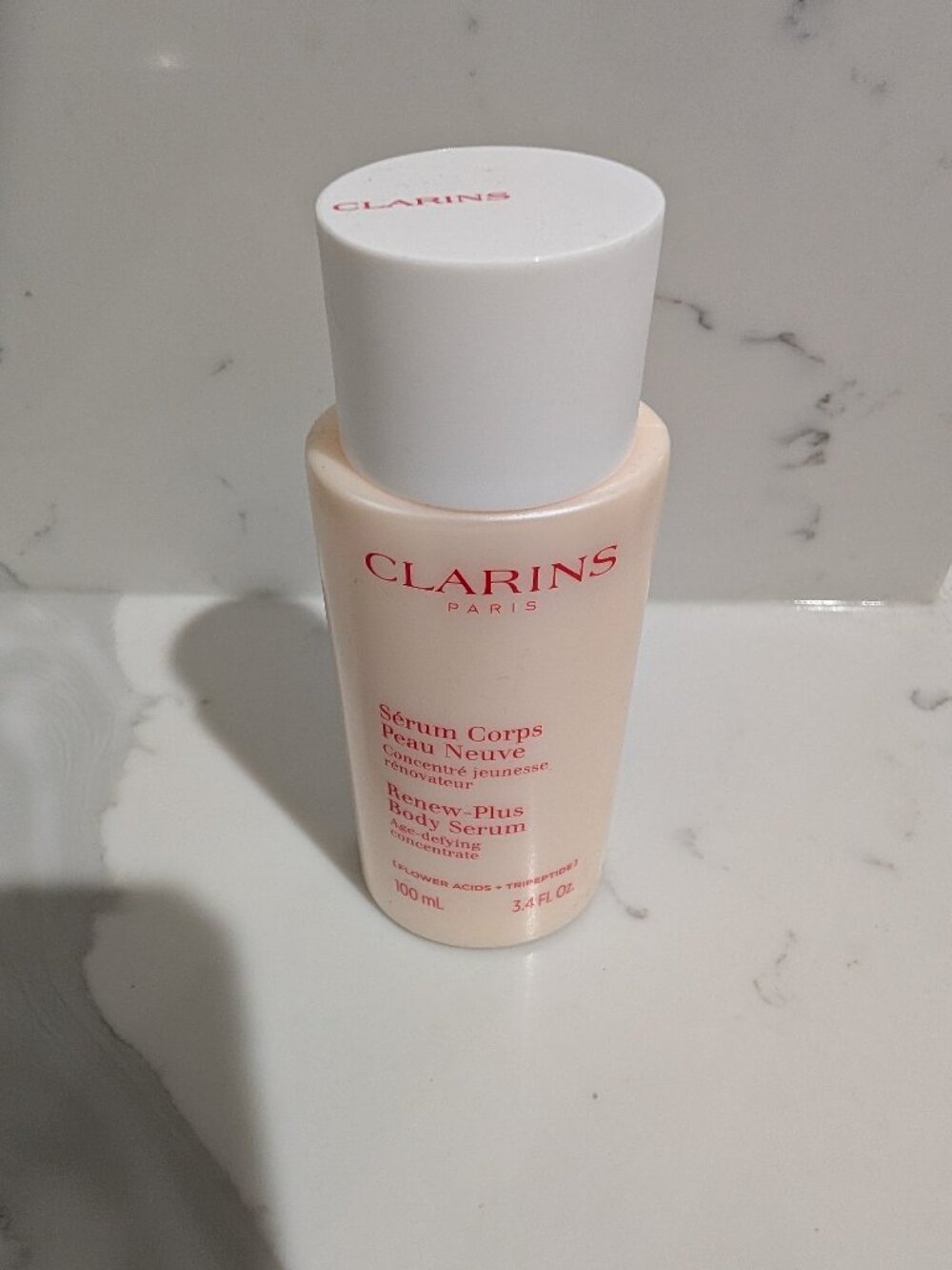 Clarins Paris renew plus body serum age defying concentrate